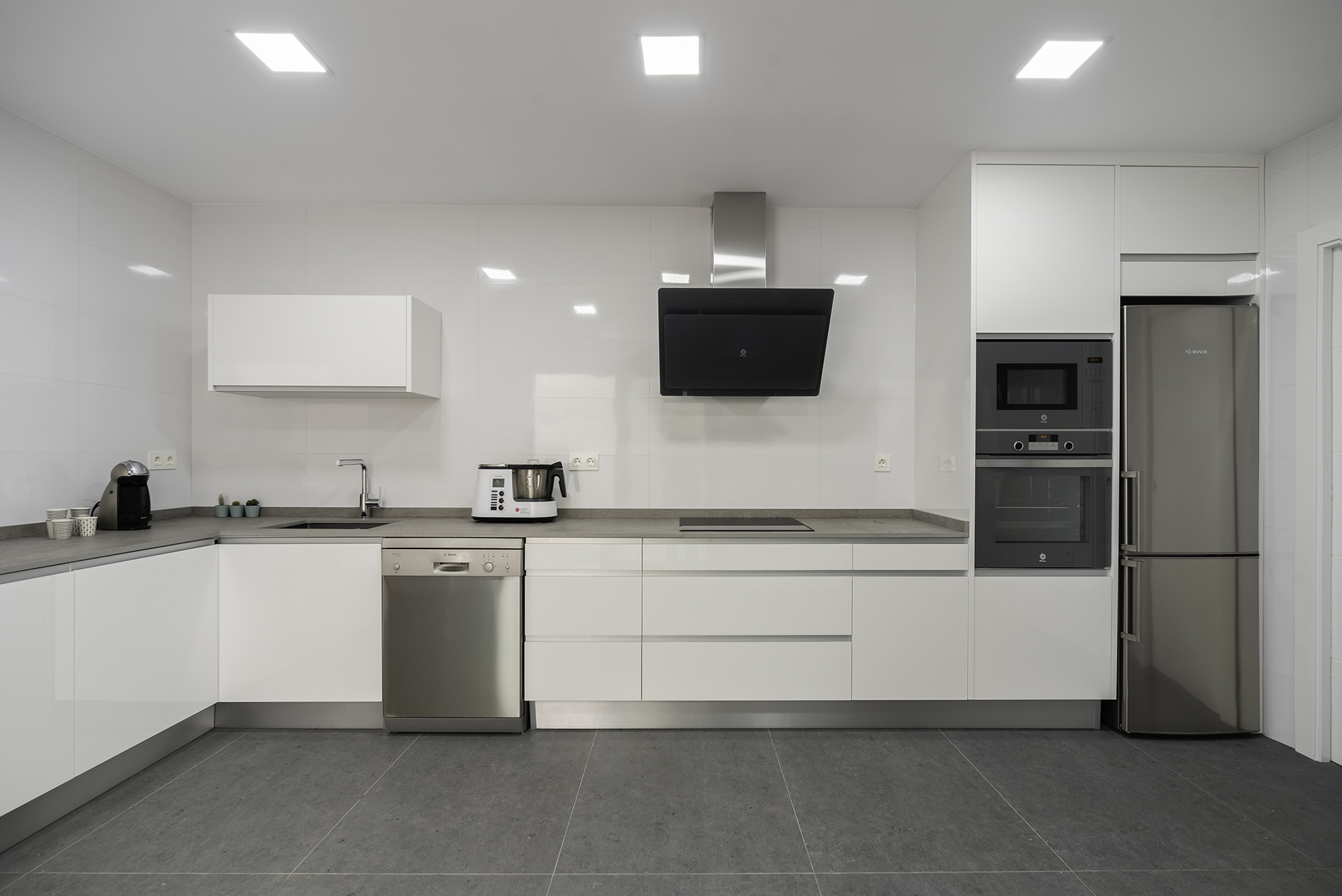 Grey Crest esvibar arquitectes cocina patio proyecto reforma integral