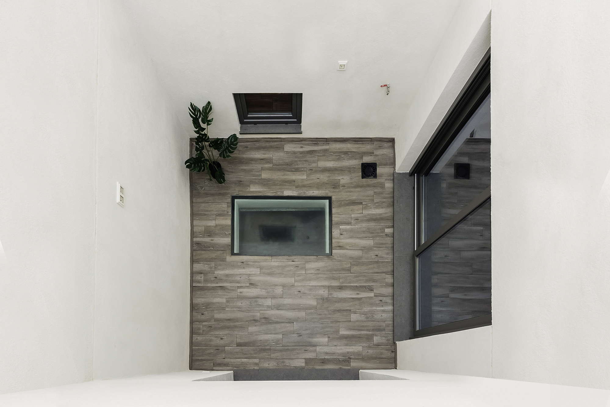 Grey Crest esvibar arquitectes patio cenital proyecto reforma integral